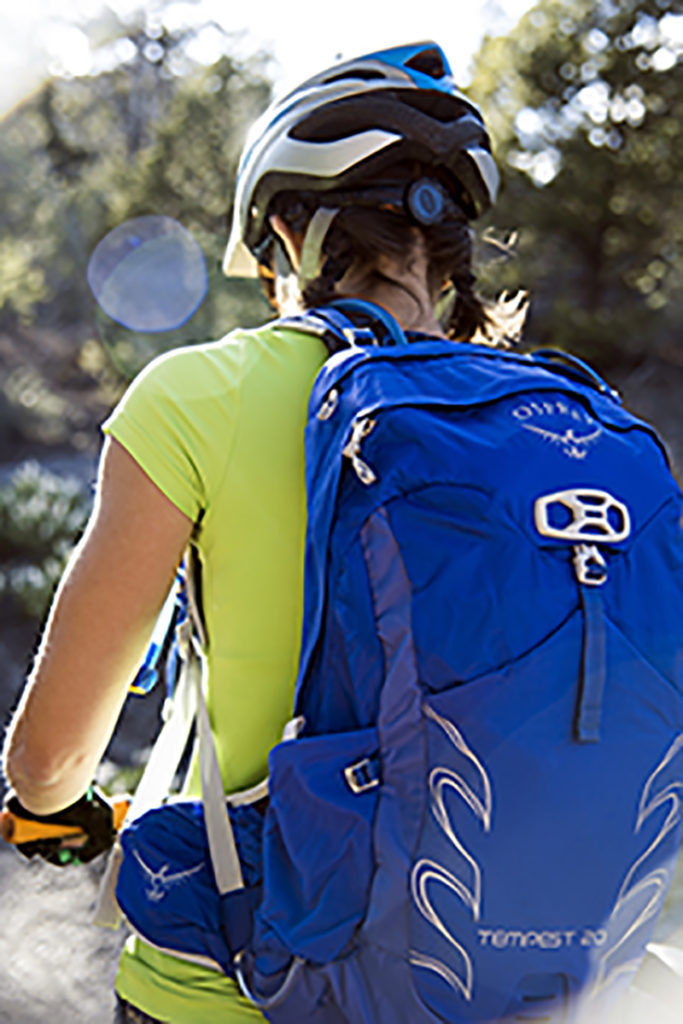 mountain-biker-with-osprey-tempest-20-pack