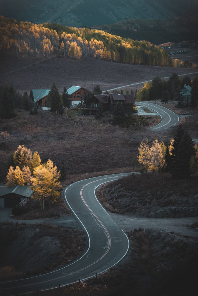 winding road fall colors crested butte colorado