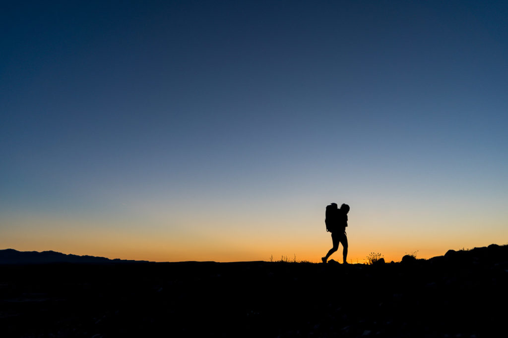 sunrise hike silhouette utah road trip